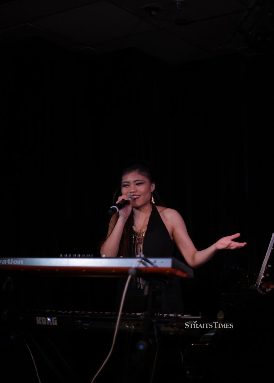 Louisa Foong is a pianist, composer and arranger (Louisa Foong)