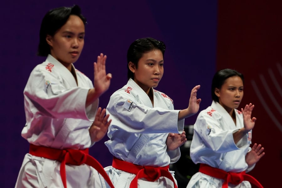 National karate exponent Lovelly Anne Robberth (Right) will not rest on her laurels or be carried away with the two silver medal feat at the 2022 Hangzhou Asian Games but would rather work extra hard to climb up the world ranking. - Bernama file pic