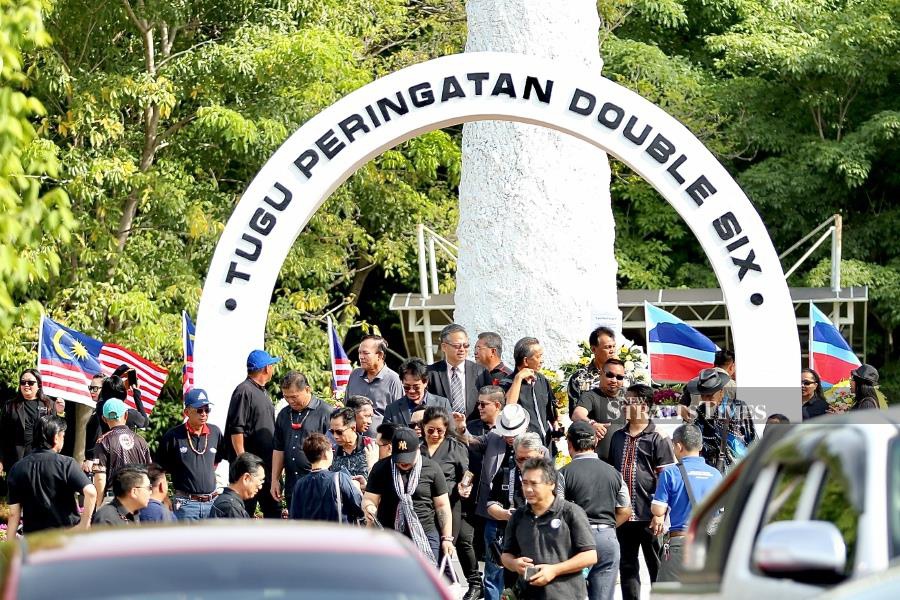 Some members from the NGO, Sunduvan Sabah along with the public attended the ceremony to commemorate the "Double Six" tragedy at the Double Six monument, in Sembulan today. - NSTP/MOHD ADAM ARININ