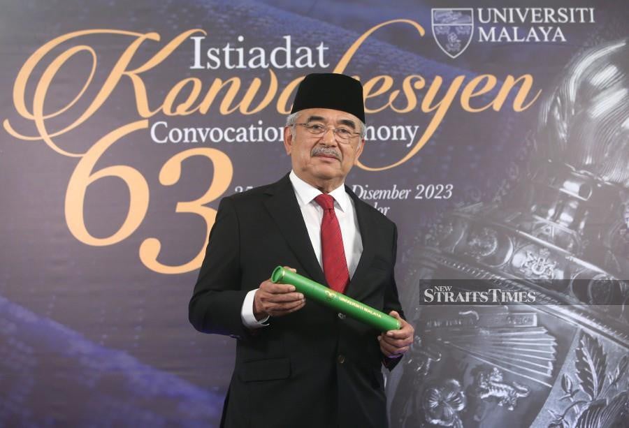 Yang Dipertua Negeri of Melaka Tun Dr Mohd Ali Mohd Rustam was awarded a Doctorate in History and Archeology by the Faculty of Arts and Social Sciences for his research on "The Government's Role in Empowering Leadership and Socioeconomics of Youth in Malaysia, 1963-2013". NSTP/MOHAMAD SHAHRIL BADRI SAALI