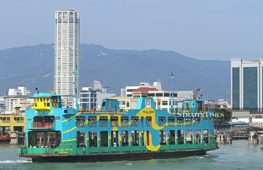 One of the most adventurous ways to cross this famous and busy waterway is on a Penang ferry.