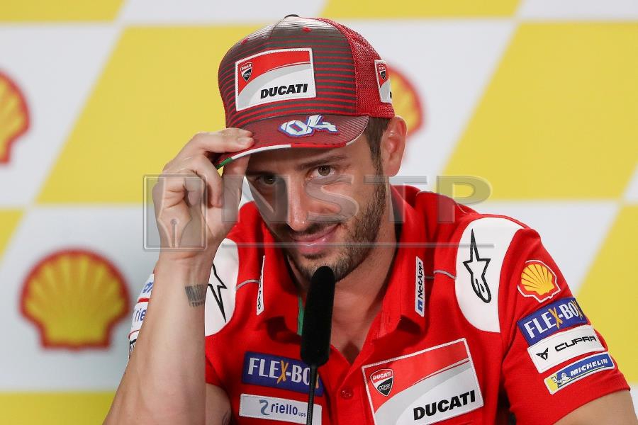 (File pix) Italian MotoGP driver Andrea Dovizioso of Ducati Team attends a press conference ahead the Motorcycling Grand Prix of Malaysia 2018 in Sepang International Circuit, outside Kuala Lumpur, Malaysia, 01 November 2018. The 2018 Malaysia Motorcycling Grand Prix will take place on 04 November. EPA Photo