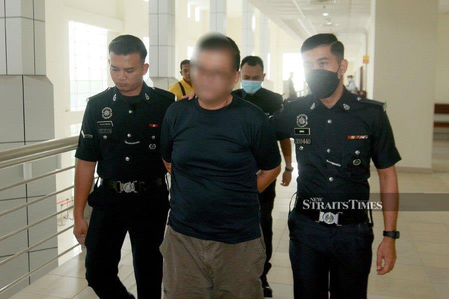 Khoo Choon Heng, 44, nodded in understanding after the charge was read out to him before magistrate Amirul Asyraf Abd Rashid.- NSTP/FAIZ ANUAR