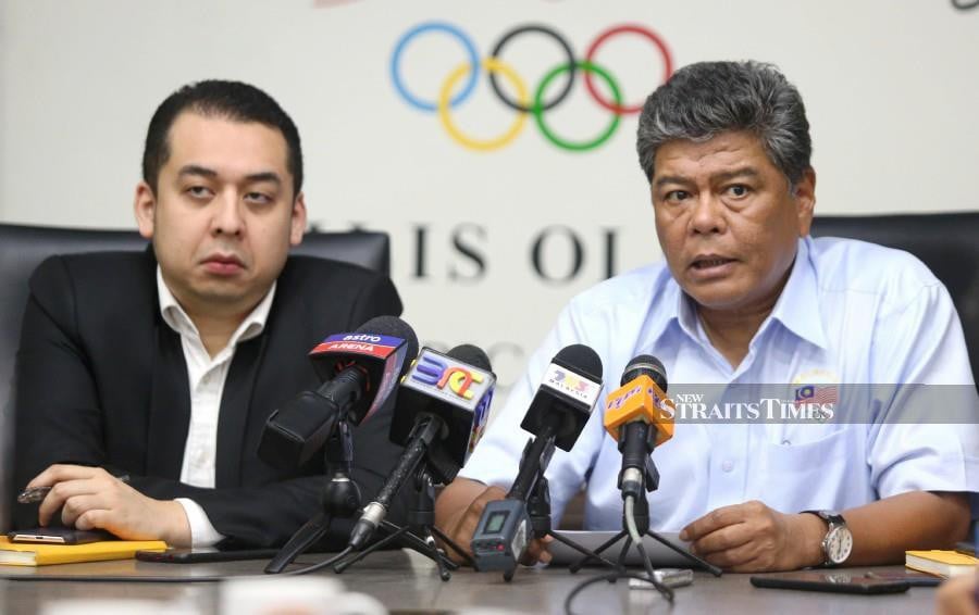 Olympic Council of Malaysia (OCM) deputy president, Datuk Seri Abdul Azim Mohd Zabidi (right) dan secretary-general, Datuk Mohd Nafizuddin Mohd Najib, want the concerned national sports associations (NSAs) to pay their dues from the Indonesia Asian Games which took place in August last year. This was announced after OCM’s executive board meeting held at Wisma OCM on Jalan Hang Jebat earlier today (Tuesday). (PIC BY MOHAMAD SHAHRIL BADRI SAALI)