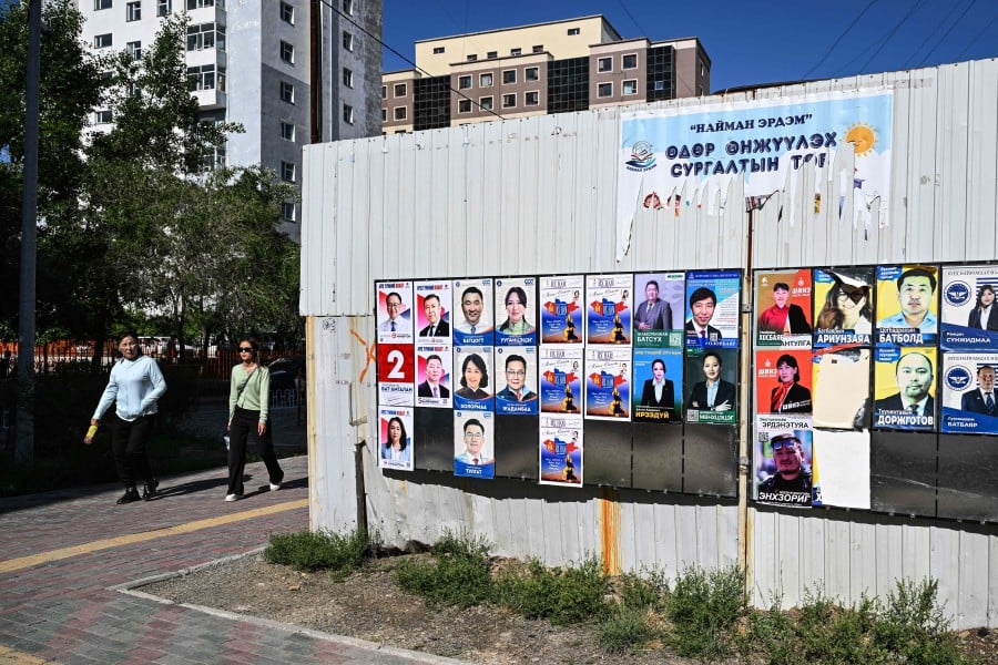 Posters of candidates for the parliamentary elections are seen on a street in Ulaanbaatar, Mongolia on June 23, 2024, ahead of the parliamentary elections on June 28. AFP