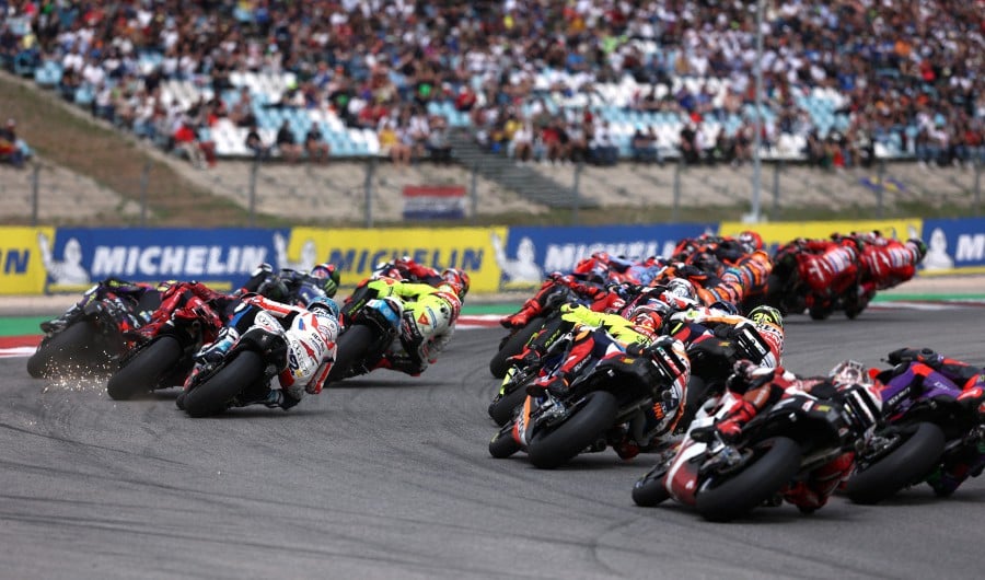 MotoGP said in a statement that Liberty Media would acquire “approximately 86 per cent” stake from Spain-based owners Dorna in a deal valued at €4.2 billion (RM21.4 billion). REUTERS FILE PIC