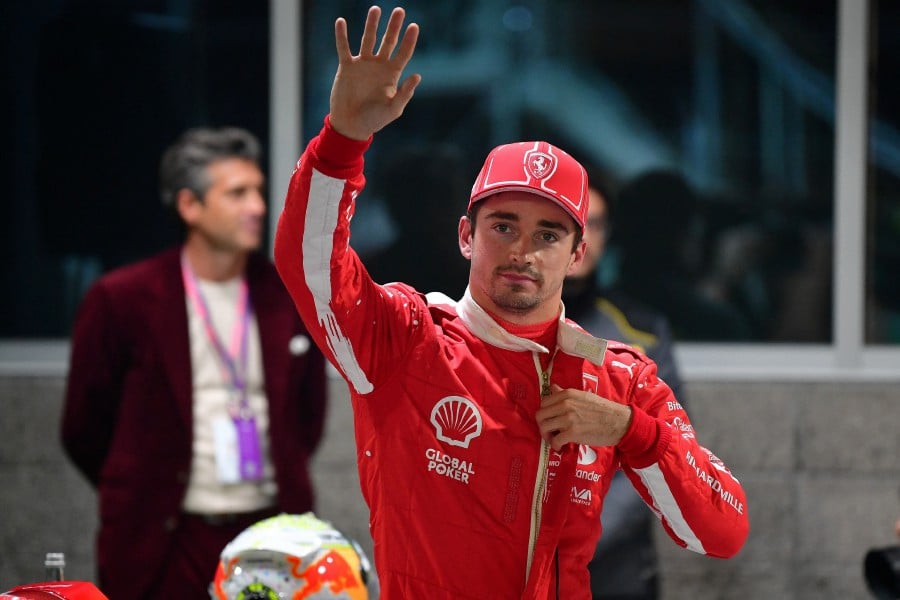 Scuderia Ferrari driver Charles LeClerc of Monaco (16) celebrates after securing pole position during qualifying at Las Vegas Strip Circuit. AFP PIC
