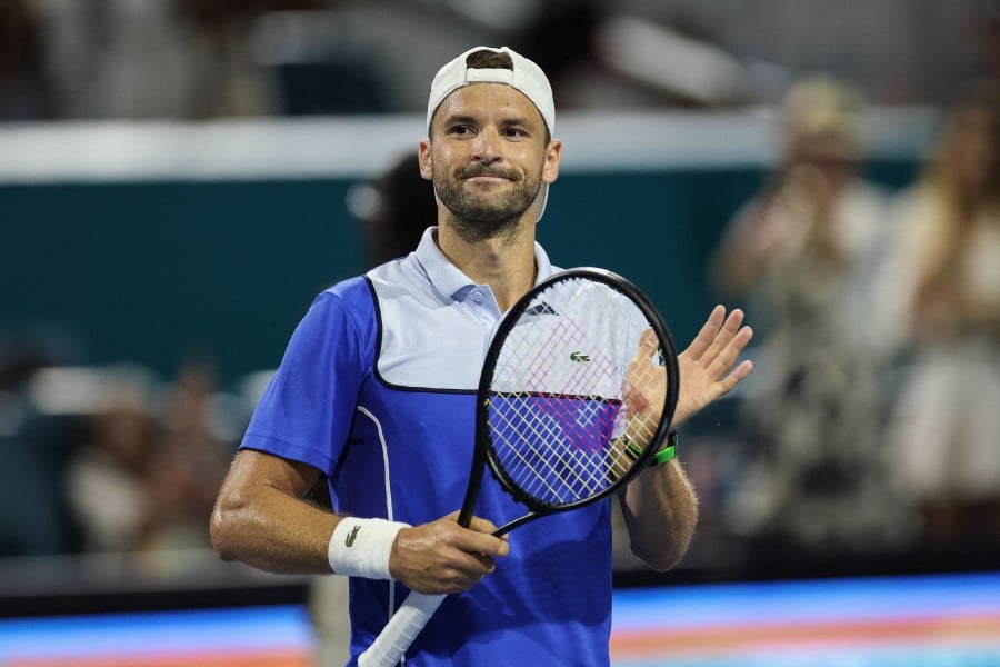 MIAMI GARDENS, FLORIDA - MARCH 29: Grigor Dimitrov of Bulgaria reacts after his win against Alexander Zverev of Germany after the Men's semifinal at Hard Rock Stadium on March 29, 2024 in Miami Gardens, Florida. AFP PIC