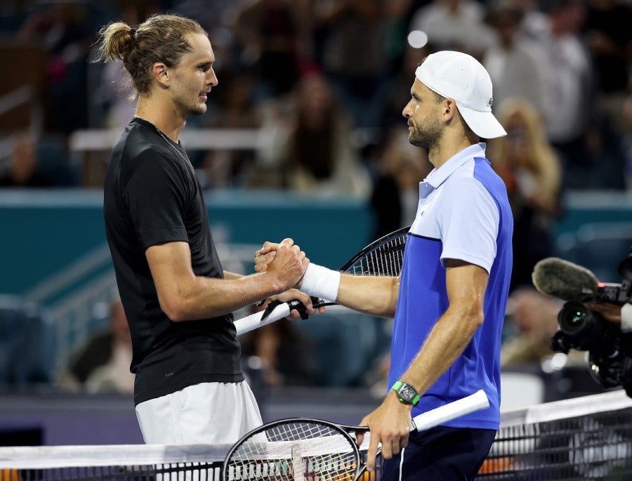 Alexander Zverev of Germany congratulates Grigor Dimitrov of Bulgaria after the Men's semifinal at Hard Rock Stadium on March 29, 2024 in Miami Gardens, Florida. Dimitrov will take on Jannik Sinner in the final. AFP PIC