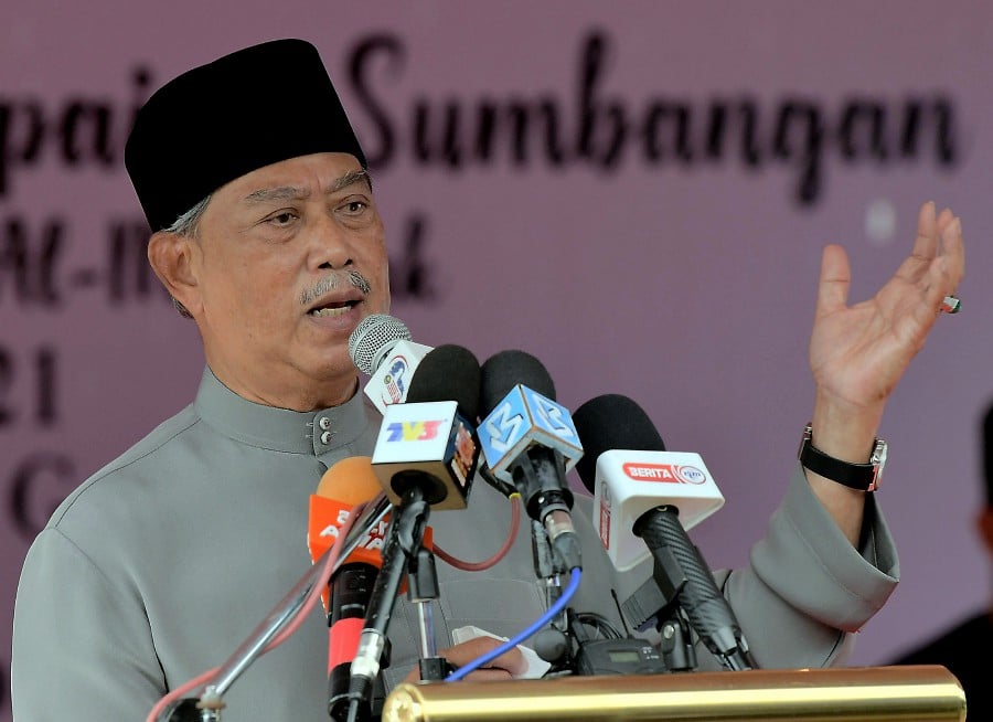 Prime Minister Tan Sri Muhyiddin Yassin said among factors that still caused infection was non-compliance of standard operating procedures (SOP). - Bernama pic