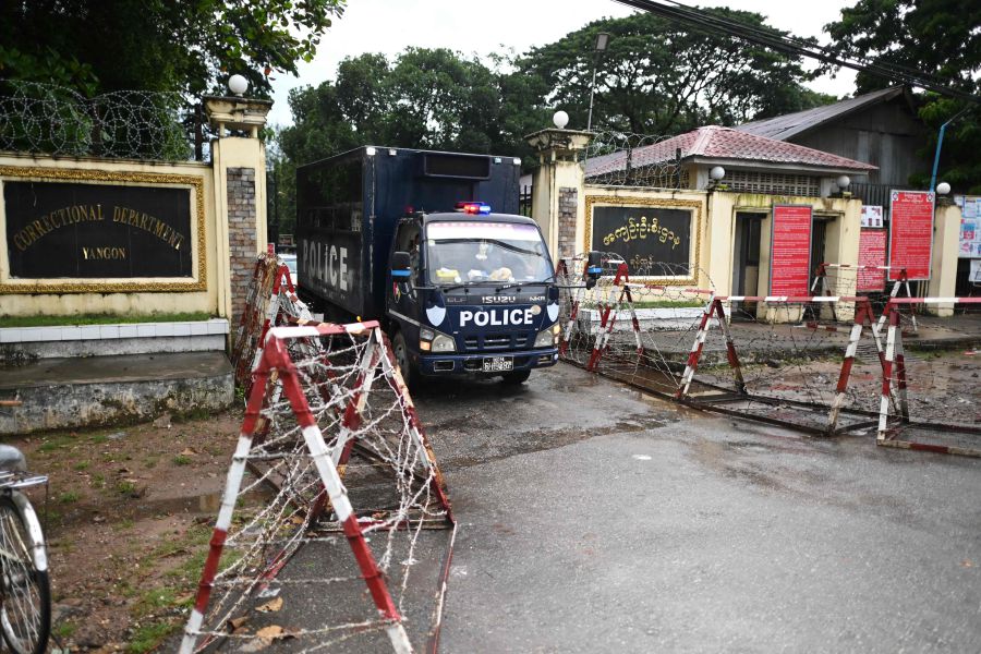 A police truck leaves from Insein Prison in Yangon, as authorities announced more than 5,000 people jailed for protesting against a February coup which ousted the civilian government would be released. - AFP file pic