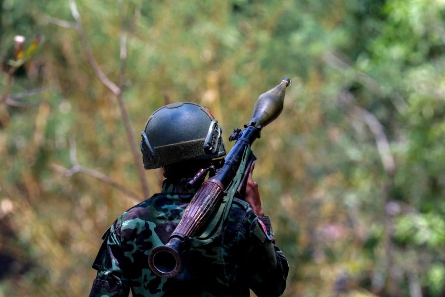 A soldier from the Karen National Liberation Army (KNLA) carries an RPG launcher at a Myanmar military base at Thingyan Nyi Naung village on the outskirts of Myawaddy, the Thailand-Myanmar border town under the control of a coalition of rebel forces led by the Karen National Union, in Myanmar, April 15, 2024. REUTERS FILE PIC