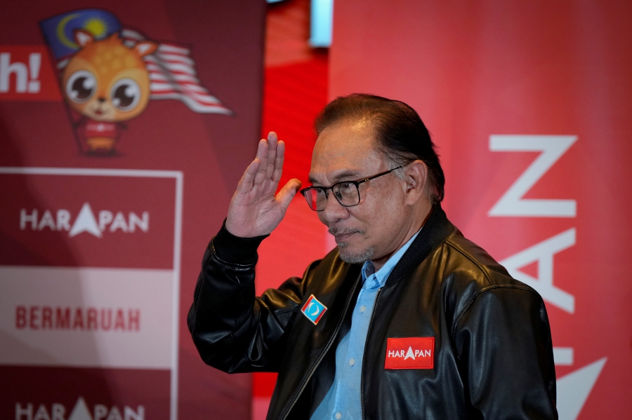 Opposition leader Anwar Ibrahim speaks during a press conference in Subang, Malaysia. Anwar is close to becoming Malaysia's new prime minister after a political party agreed to support a unity government following inconclusive general elections. (AP Photo/Vincent Thian)