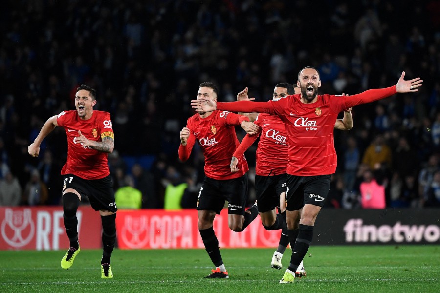 Mallorca's players celebrate after winning the Spanish Copa del Rey (King's Cup) semi final second leg football match between Real Sociedad and RCD Mallorca at the Anoeta stadium in San Sebastian. - AFP PIC
