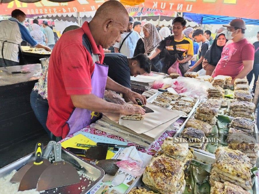 Murtabak seller Fadzil Harun said the price of onions and eggs have increased. - NSTP/Ahmad Mukhsein Mukhtar 