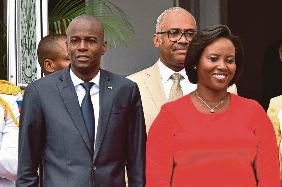In this file photo taken on May 23, 2018, Haitian President Jovenel Moise (L) and Haitian First Lady Martine Moise are seen at the National Palace in Port-au-Prince, Haiti. - AFP PIC