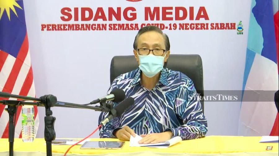 Sabah Covid-19 spokesperson Datuk Seri Masidi Manjun says Rumah Merah Cluster and Dbajaru Cluster have contributed to the spike in Covid-19 cases in Sabah today.  - Screenshot/NST