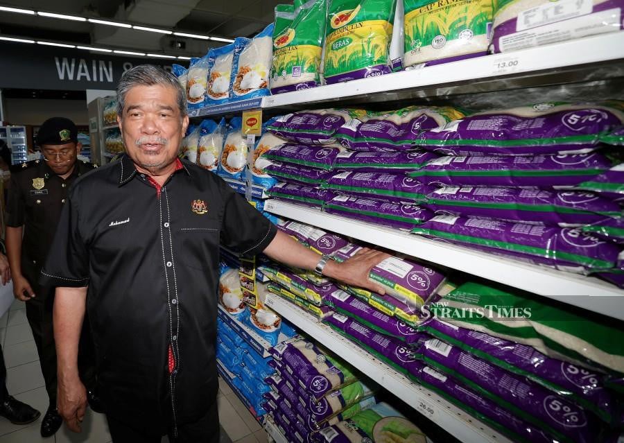 Agriculture and Food Security Minister Datuk Seri Mohamad Sabu says discussions regarding the proposal to increase the ceiling price of local white rice are still ongoing and will take a few more months before reaching a decision. - Bernama pic