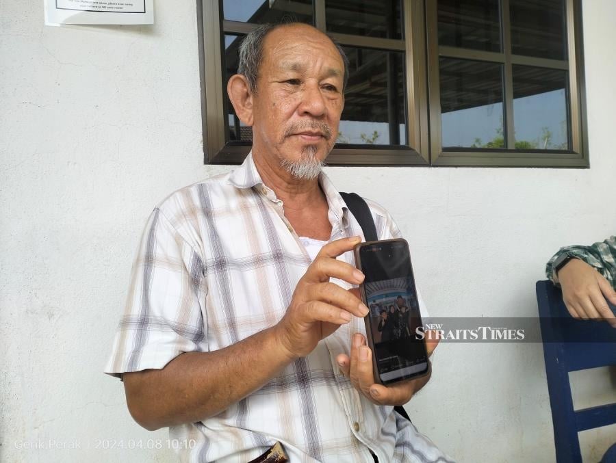 Mat Zainal Nordin, 66, said that both he and his son-in-law, Kamizan Kasimon, 42, had hugged and sought forgiveness from each other at the latter’s residence in Padang Rengas before departing to go to his in-laws in Terengganu. - NSTP/ MUHAMMAD ZULSYAMINI SUFIAN SURI