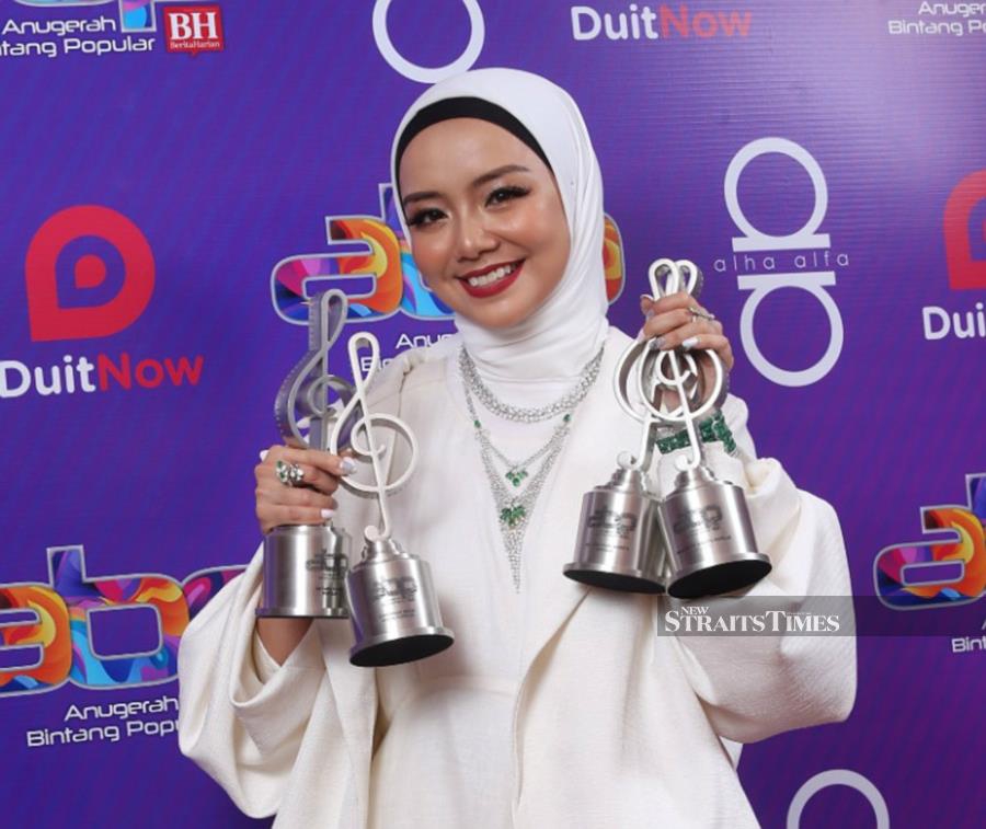 Actress and television host are two of the 'caps' worn by Mira Filzah who has been in showbiz for less than five years. - NSTP/HALIMATON SAADIAH SULAIMAN