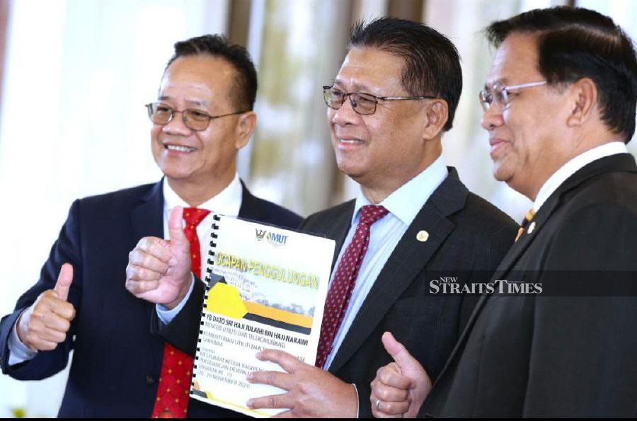 Minister for Utility and Telecommunication Sarawak Datuk Julaihi Narawi (center) said the cost of operating the Smart towers was estimated at RM207 million for a three-year period starting next year. NSTP/NADIM BOKHARI