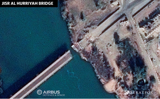 A destroyed section of the Jisr al Hurriyah Bridge crossing the Tigris River is seen in Mosul, Iraq, in this satellite image released November 18, 2016. Courtesy of Stratfor/Airbus/Handout via Reuters