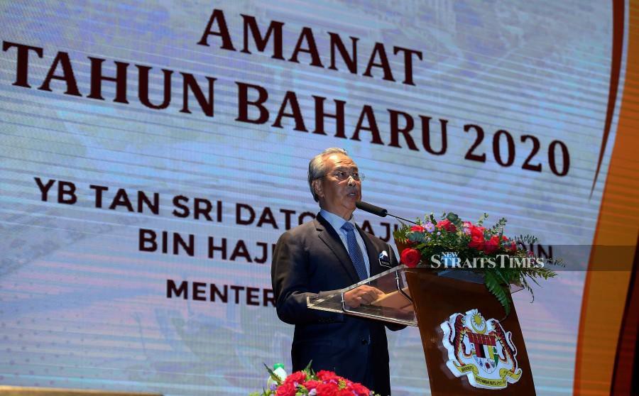 Home Minister Tan Sri Muhyiddin Yassin delivers his speech during the ministry’s gathering in Putrajaya. -NSTP/Ahmad Irham Mohd Noor.