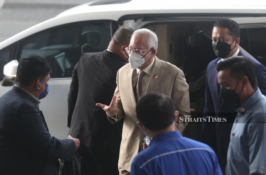 Datuk Seri Najib Razak's (centre) bid to nullify his SRC International Bhd conviction by accusing trial judge Datuk Mohd Nazlan Mohd Ghazali of being biased has been described as nothing more than a ludicrous and desperate attempt to exonerate himself of blame. - NSTP/MOHAMAD SHAHRIL BADRI SAALI