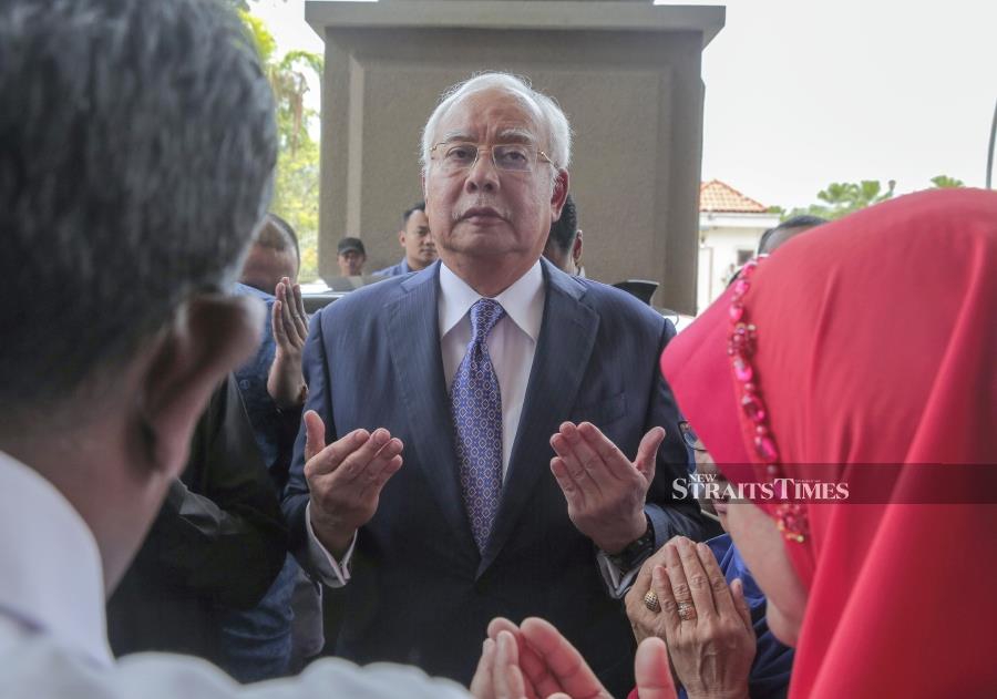 The historic trial of Datuk Seri Najib Razak officially started today depsite a last minute attempt to delay it by filing a notice of motion to challenge his charges. (NSTP/ASWADI ALIAS)