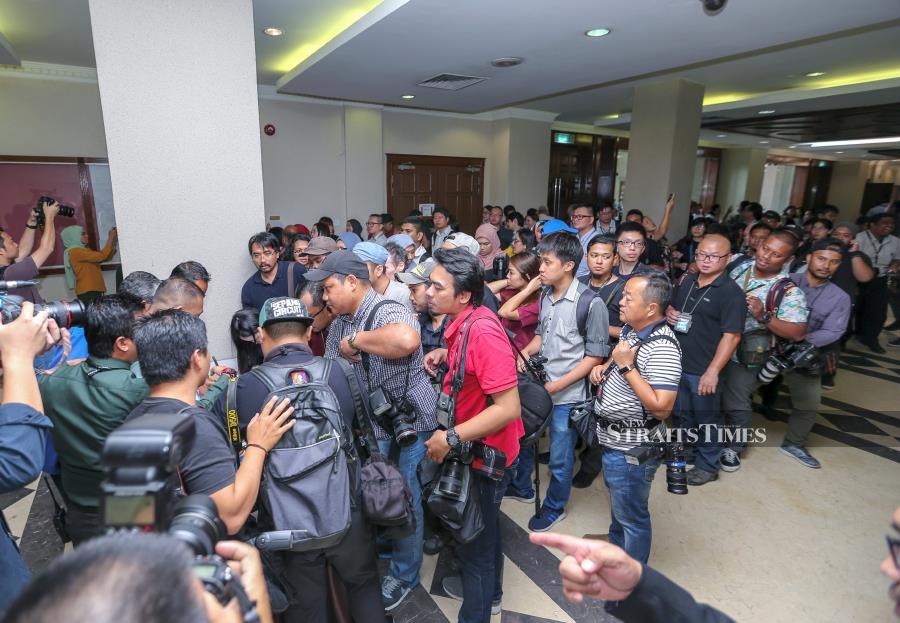 Media personnel lining up for passes at the Kuala Lumpur courthouse ahead of Datuk Seri Najib Razak’s trial. Pix by NSTP/Aswadi Alias