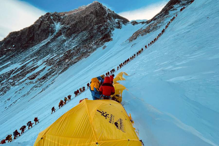 Mountaineers lined up as they climb a slope during their ascend to summit Mount Everest (8,848.86-metre), in Nepal.- AFP Pic (for illustration purposes only)