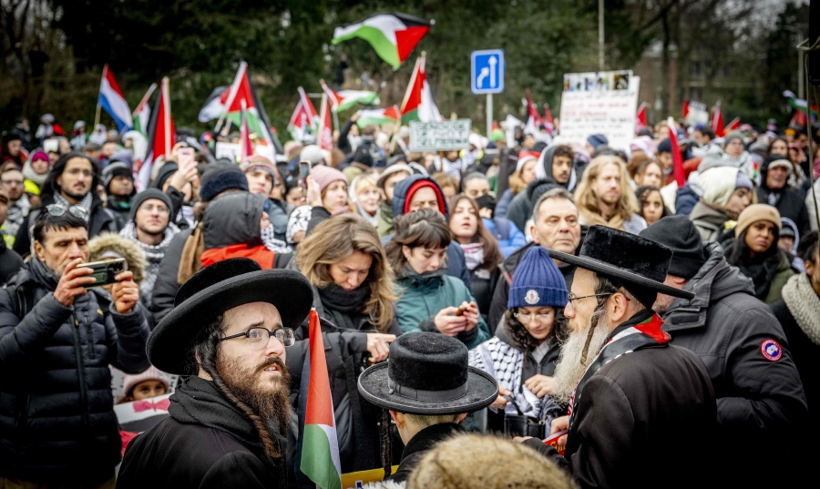 Israeli sympathisers take part in a demonstration during a hearing at the International Court of Justice (ICJ) on a genocide complaint by South Africa against Israel, in The Hague. (Photo by Robin Utrecht / ANP / AFP)