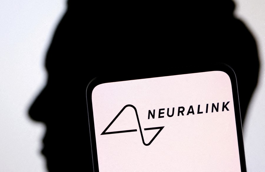 Neuralink logo and Elon Musk silhouette are seen in this illustration taken, December 19, 2022. REUTERS FILE PIC