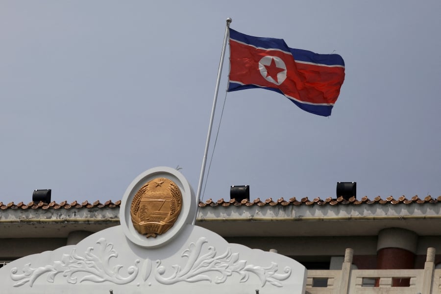 (FILE PHOTO) The North Korean flag flutters at the North Korea consular office in Dandong, Liaoning province, China. (REUTERS/Tingshu Wang/File Photo)