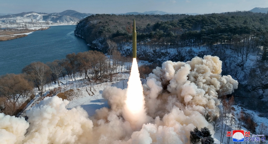 (FILE PHOTO) Ballistic missile, said to be solid-fuel and hypersonic, launches during a test at an unspecified location in North Korea in this picture released by the Korean Central News Agency. (KCNA via REUTERS)