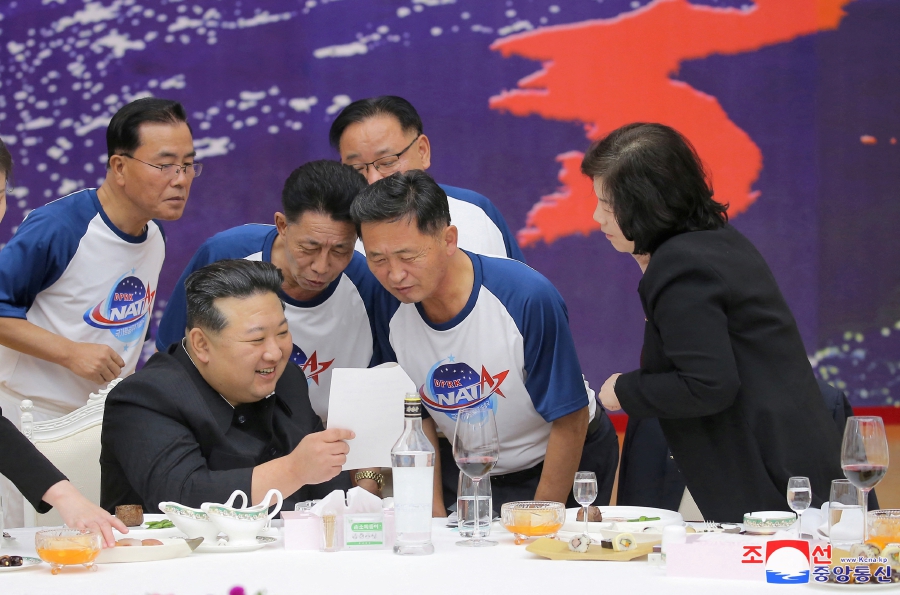 North Korea's leader Kim Jong-un attends a banquet to celebrate the launch of a reconnaissance satellite. (KCNA via REUTERS)