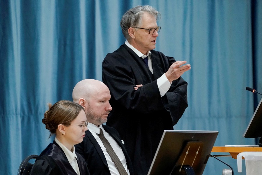 Anders Behring Breivik sits between his representatives, lawyer Oystein Storrvik and associate attorney Marte Lindholm, in the courtroom at Ringerike prison, in Tyristrand, Norway, January 8, 2024. REUTERS PIC