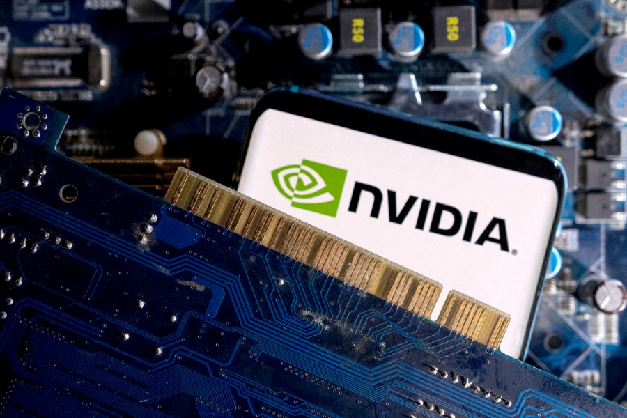 FILE PHOTO: A smartphone with a displayed NVIDIA logo is placed on a computer motherboard in this illustration taken March 6, 2023. REUTERS/Dado Ruvic/Illustration/File Photo