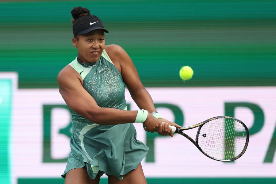 Naomi Osaka of Japan returns a shot to Sara Errani of Italy during the BNP Paribas Open at Indian Wells Tennis Garden on March 07, 2024 in Indian Wells, California. - AFP pic