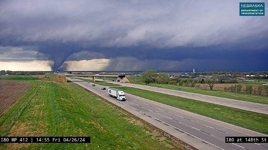 This traffic cam image obtained from the Nebraska Department of Transportation shows a tornado crossing Interstate Highway 80 near Waverly, Nebraska. - AFP PIC