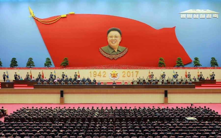 In this Wednesday, Feb. 15, 2017, photo distributed on Thursday, Feb. 16, 2017, by the North Korean government, North Korean leader Kim Jong Un, center, sits at the podium during a national meeting to celebrate the 75th birth anniversary of the late leader Kim Jong Il, in Pyongyang, North Korea. Iorth Korea had few friends even before the assassination of the leader's half-brother at a Kuala Lumpur airport last week, but the fallout from the killing looks set to further isolate the nuclear-armed state. AP Photo