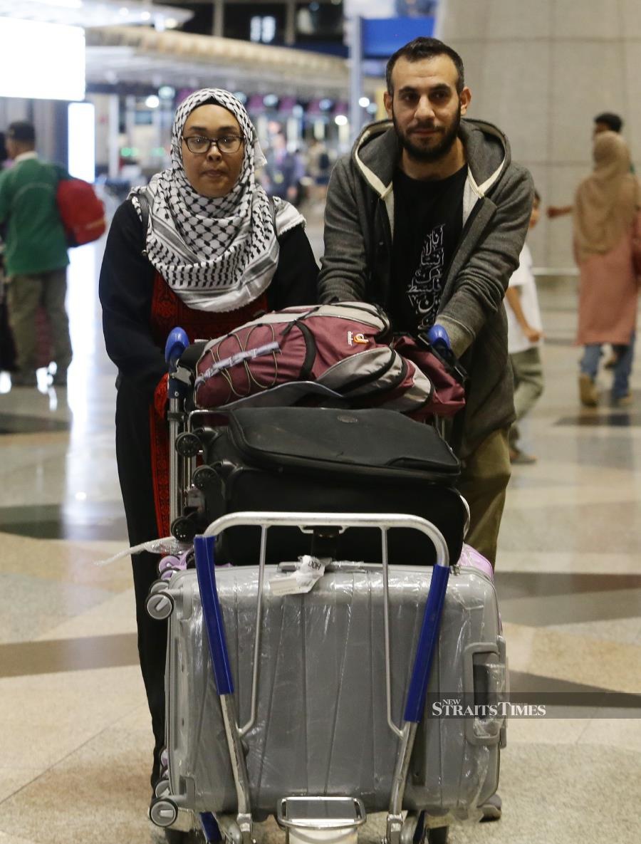 Nurul Ain Haron arrived with her Palestinian husband. - - NSTP/MOHD FADLI HAMZAH
