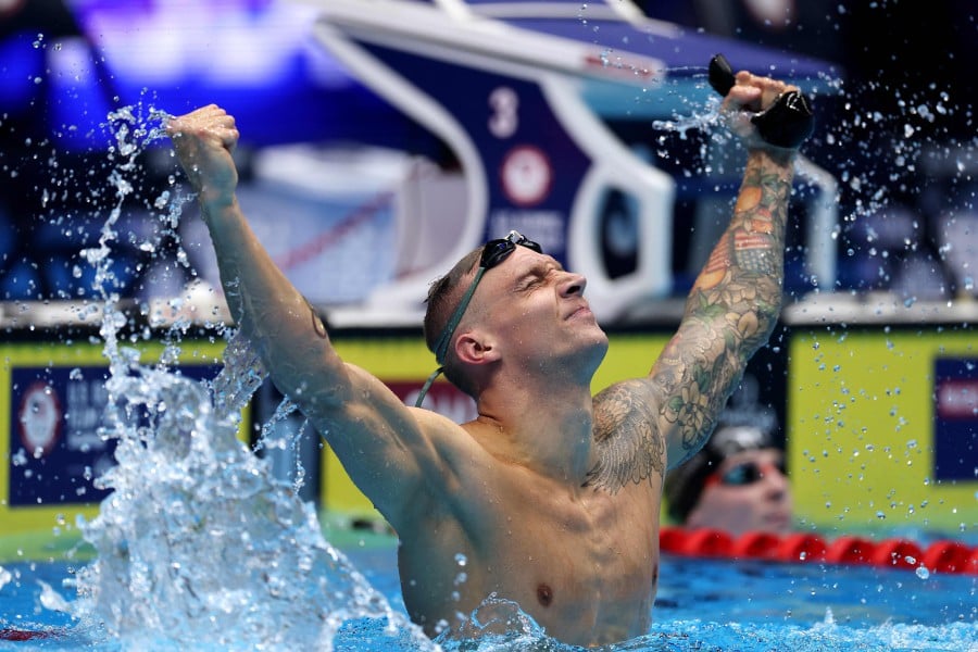 Dressel wins 100m butterfly at US trials to book Olympic title defense