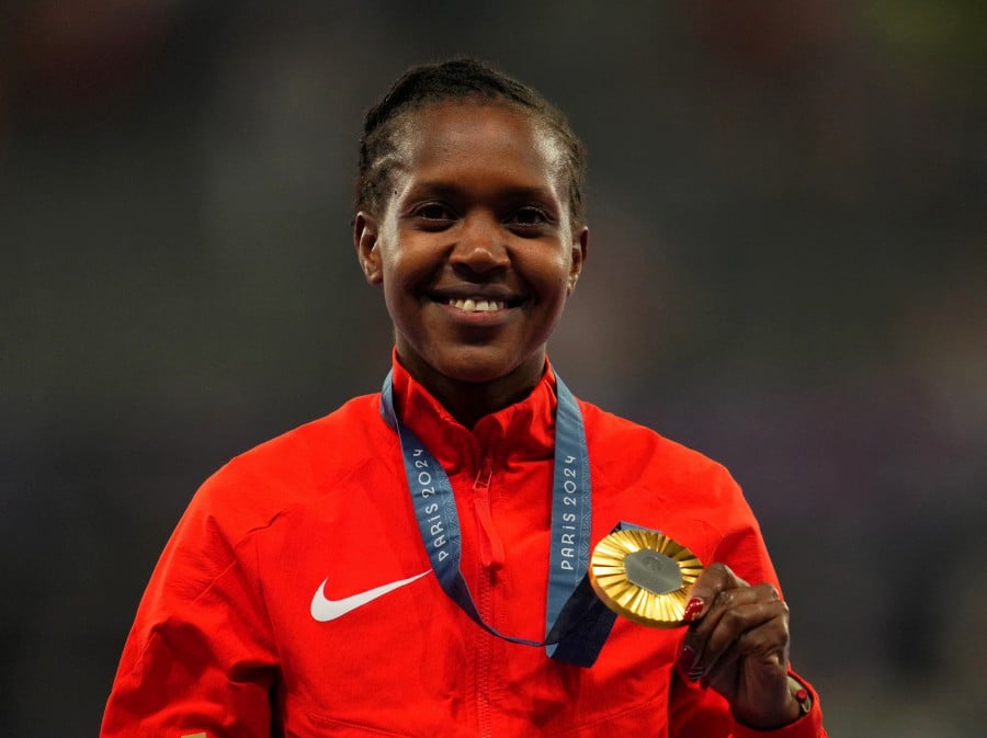 OLYMPICS-2024Faith_Kipyegon110824_1723355891.jpg