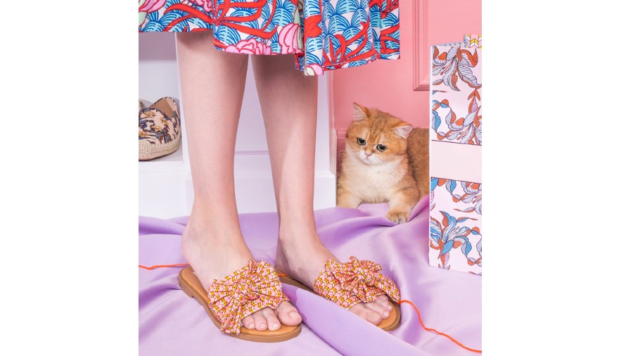 Even the cat is taken with the sandals.