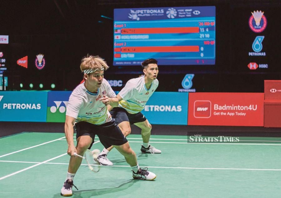 Ong Yew Sin and Teo Ee Yi (left) in action at the recent Malaysia Open at Axiata Arena, Bukit Jalil. PIC BYASWADI ALIAS