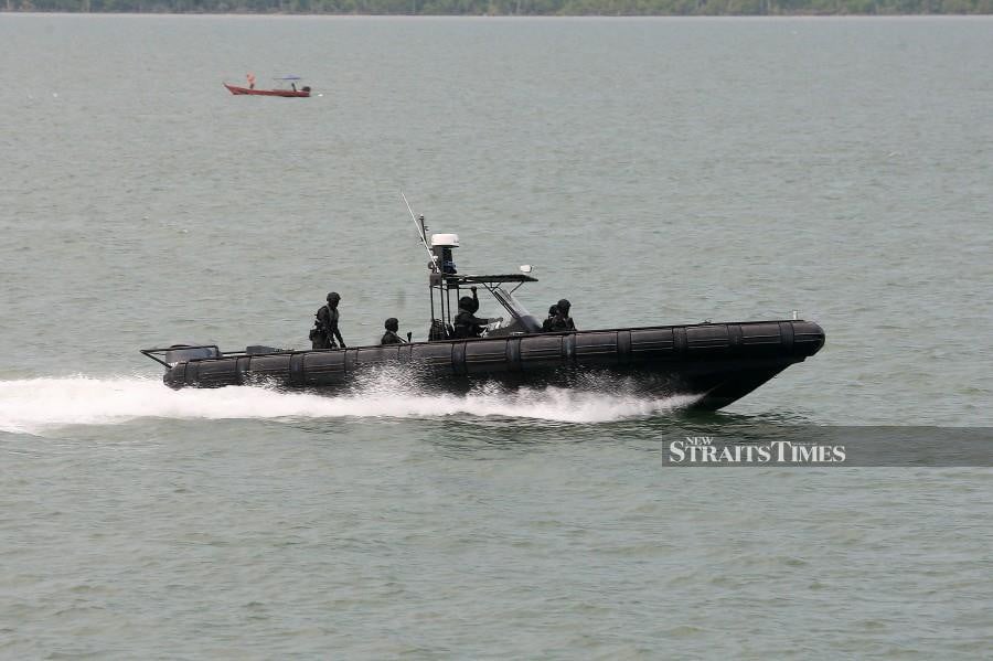 Enforcement officers on patrol near Pelabuhan Klang - FILE PIC
