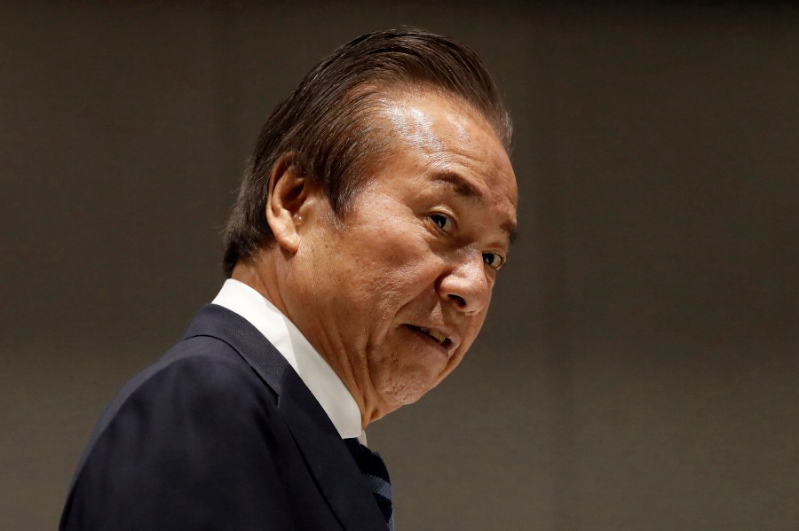 FILE - Haruyuki Takahashi, executive board member of the Tokyo Organizing Committee of the Olympic and Paralympic Games arrives at Tokyo 2020 Executive Board Meeting in Tokyo on March 30, 2020. Japanese prosecutors arrested Takahashi and three employees of a clothing company on bribery charges Wednesday. - AP pic