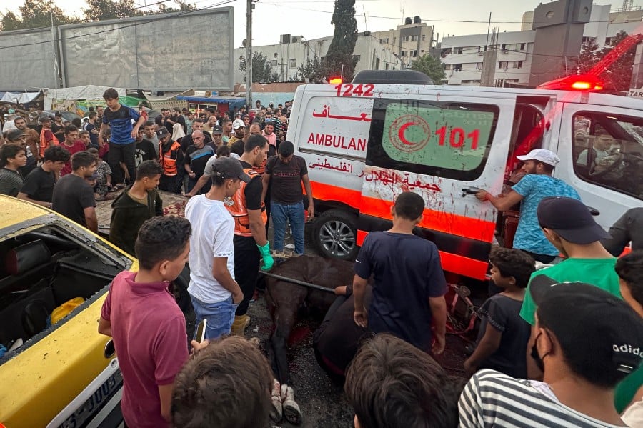 IDF strikes an ambulance convoy. Gaza health officials says it was carrying  the wounded, Israel says they were militants.