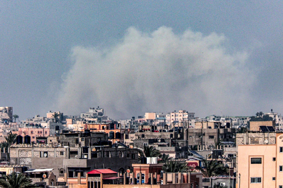 Smoke billowing over Khan Younis in the southern Gaza Strip during Israeli bombardment, amid ongoing battles between Israel and the Palestinian militant group Hamas. (Photo by SAID KHATIB / AFP)